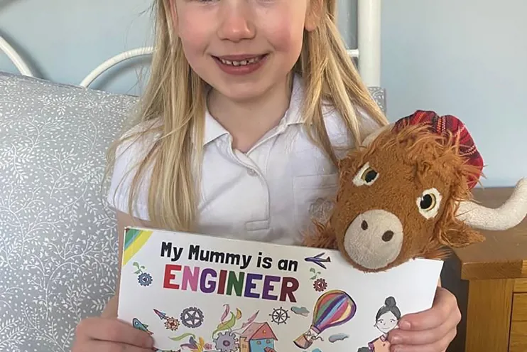 Child holding my mummy is an engineer book