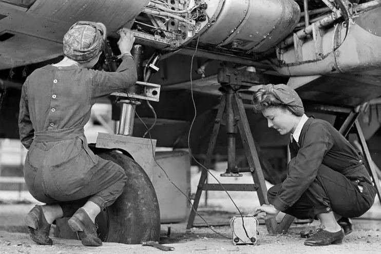 IET Archive image of two female World War Two technicians working on an aircraft