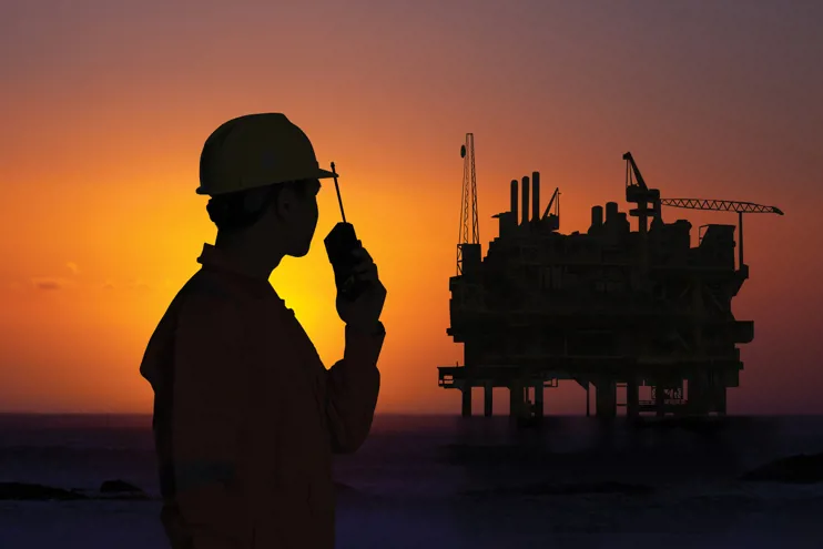 Engineer near an off-shore oil rig