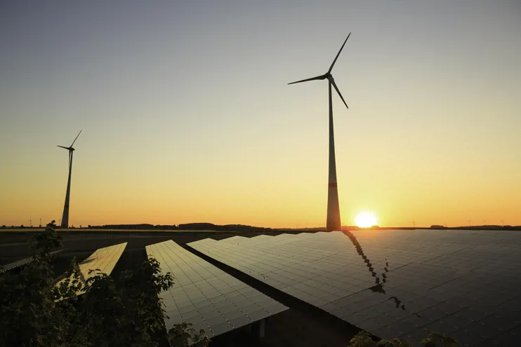 Renewable energy: wind turbines and modern solar panels