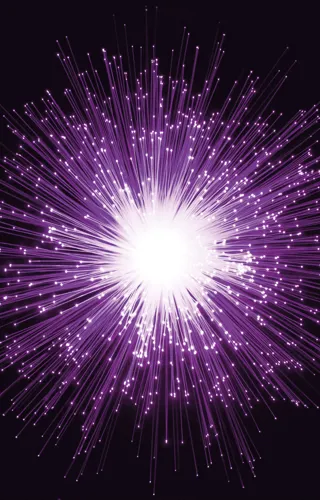 Explosion of purple light on a black background
