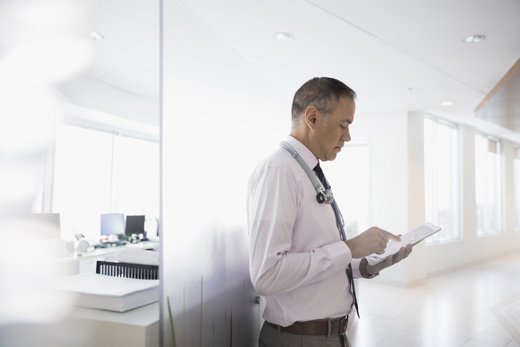 doctor-using-padd-outside-laboratory.jpg