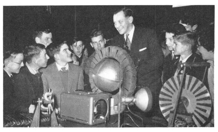 Dr Laithwaite with audience in 1959 delivering his Christmas Holiday Lecture 'Invention and new machines' Journal of the Institution of Electrical Engineers February 1959