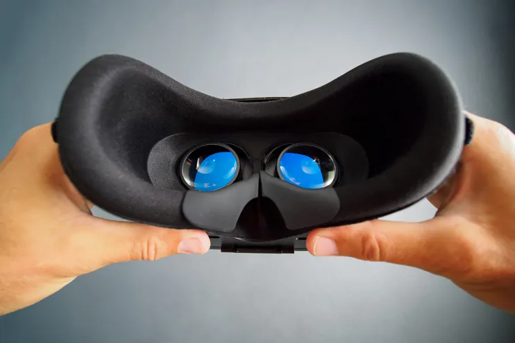 Person holding VR goggles